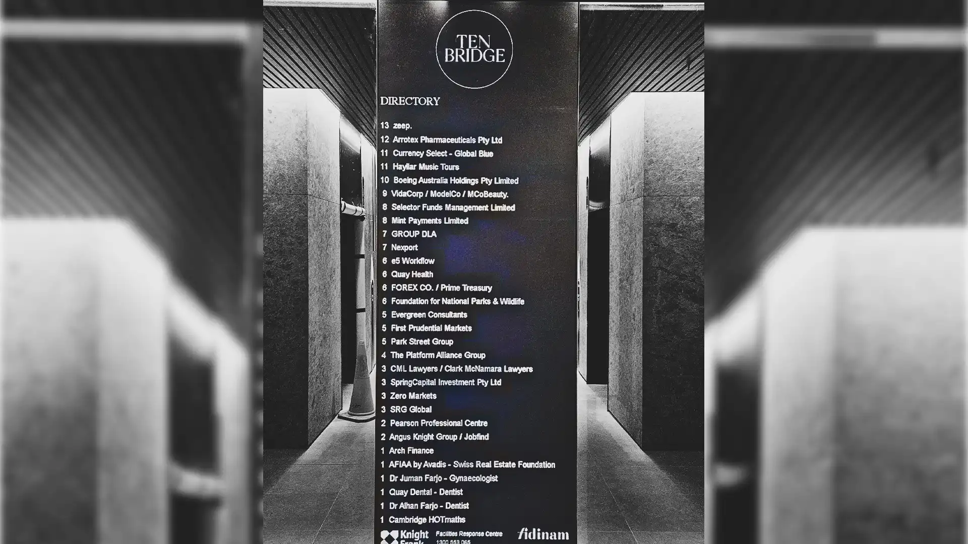 LED Screen directory board installation at 10 Bridge St building lobby providing digital listings and navigation