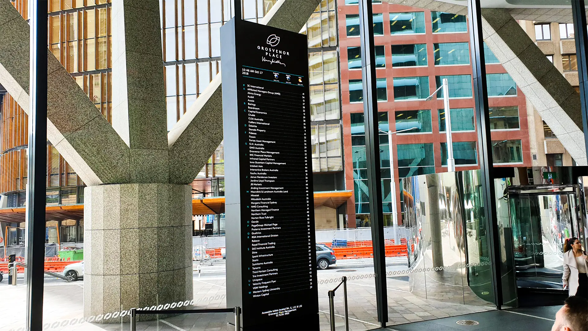 Sports venue LED video wall showing live scoreboard and replay content