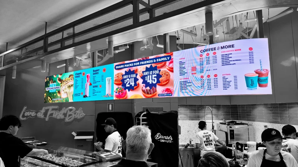 Retail store LED display screen promoting products with vivid digital content